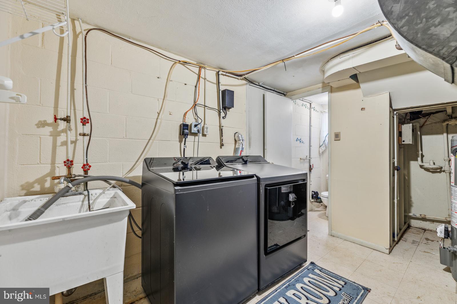 12423 Rambler Road Philadelphia, PA 19154 - Photo 35 of 46 a kitchen with a sink and a refrigerator