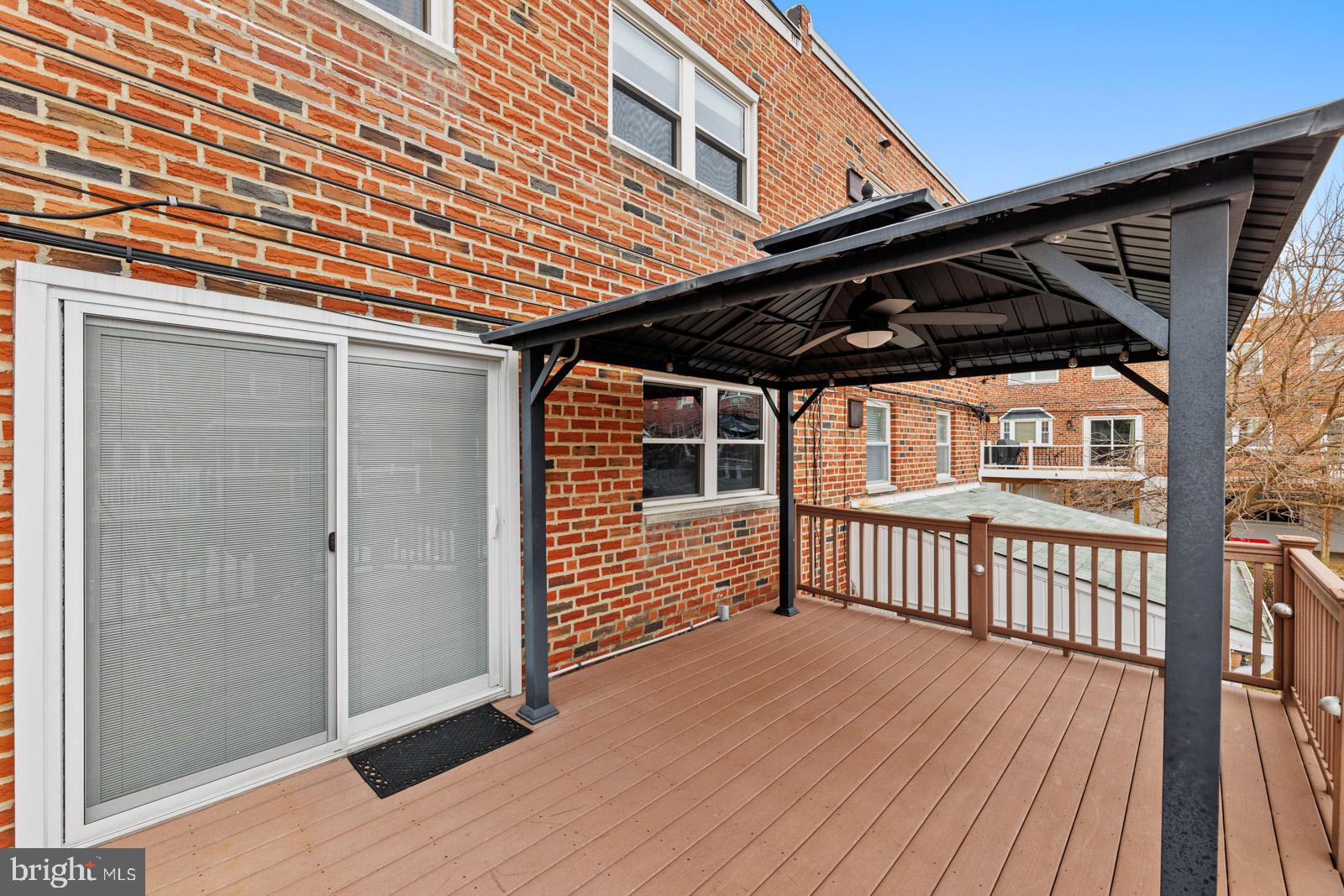 12423 Rambler Road Philadelphia, PA 19154 - Photo 39 of 46 a view of a porch with wooden floor and fence