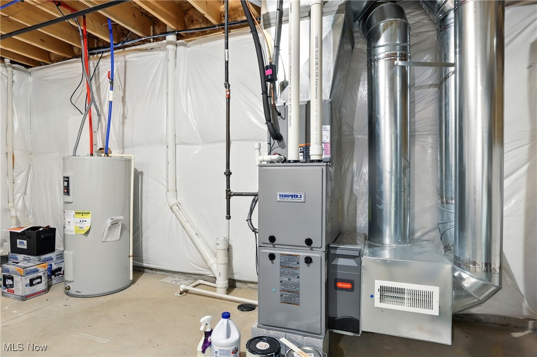 2112 Fowl Road Elyria, OH 44035 - Photo 38 of 49 Utility room featuring electric water heater