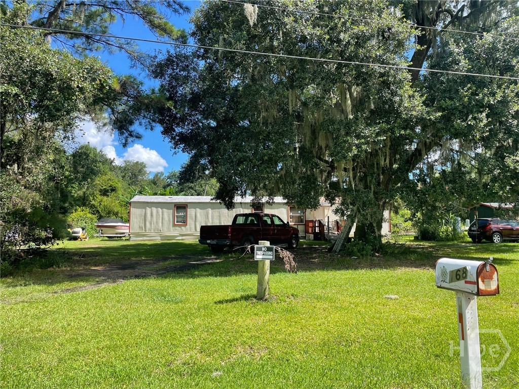 168 Sherwood Road Rincon, GA 31326 - Photo 2 of 11 Mobile home will remain, but not be shown. No value given.
