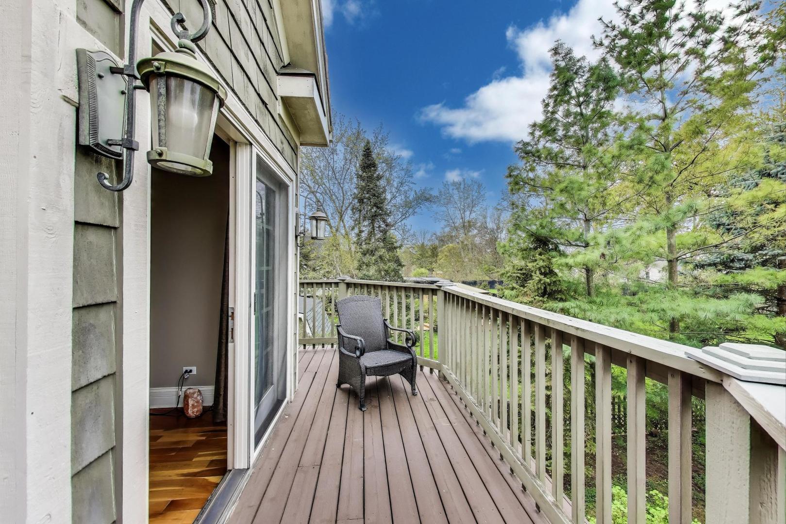 628 Greenwood Road Northbrook, IL 60062 - Photo 28 of 54 a view of a balcony with wooden floor