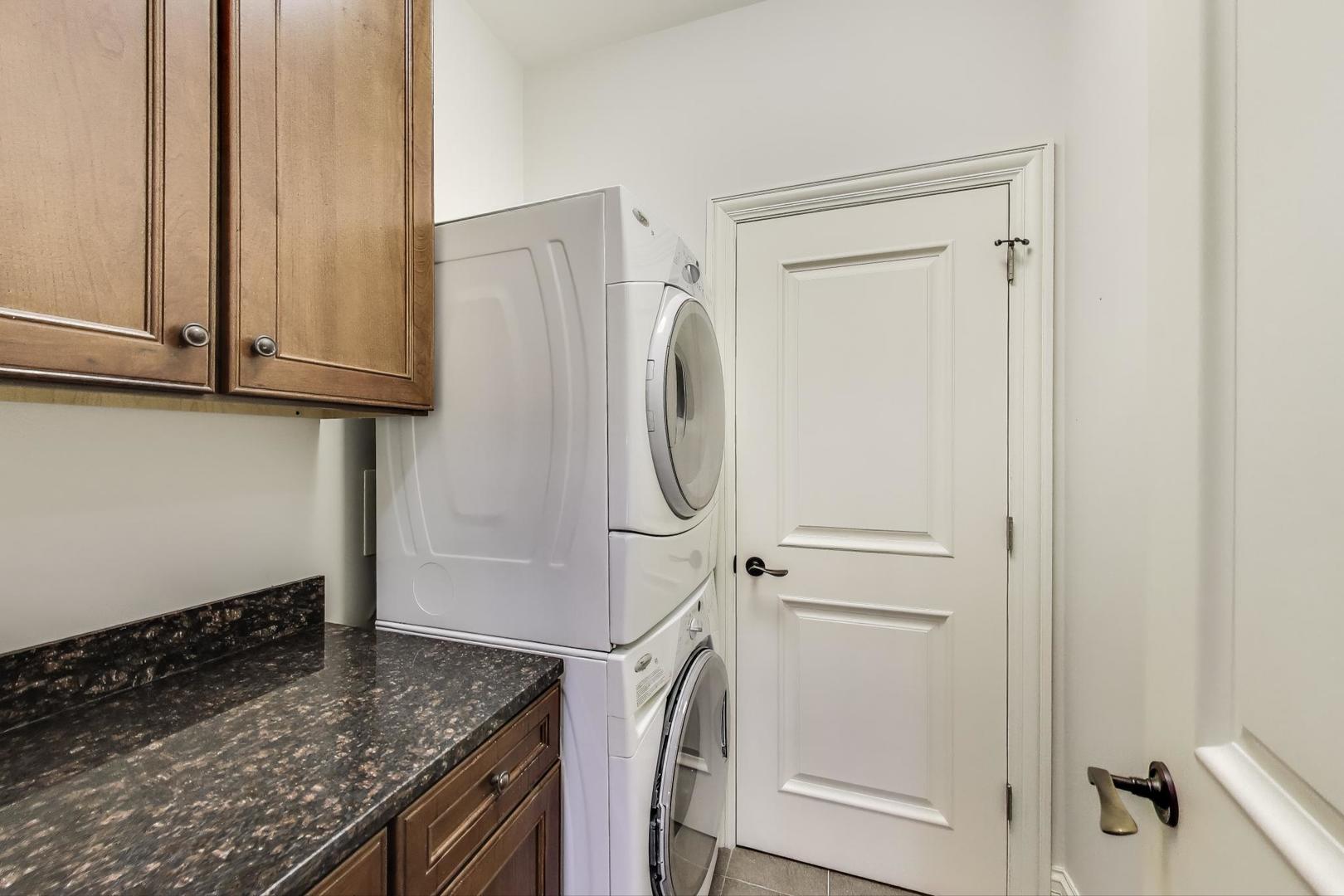 628 Greenwood Road Northbrook, IL 60062 - Photo 41 of 54 a utility room with dryer and washer
