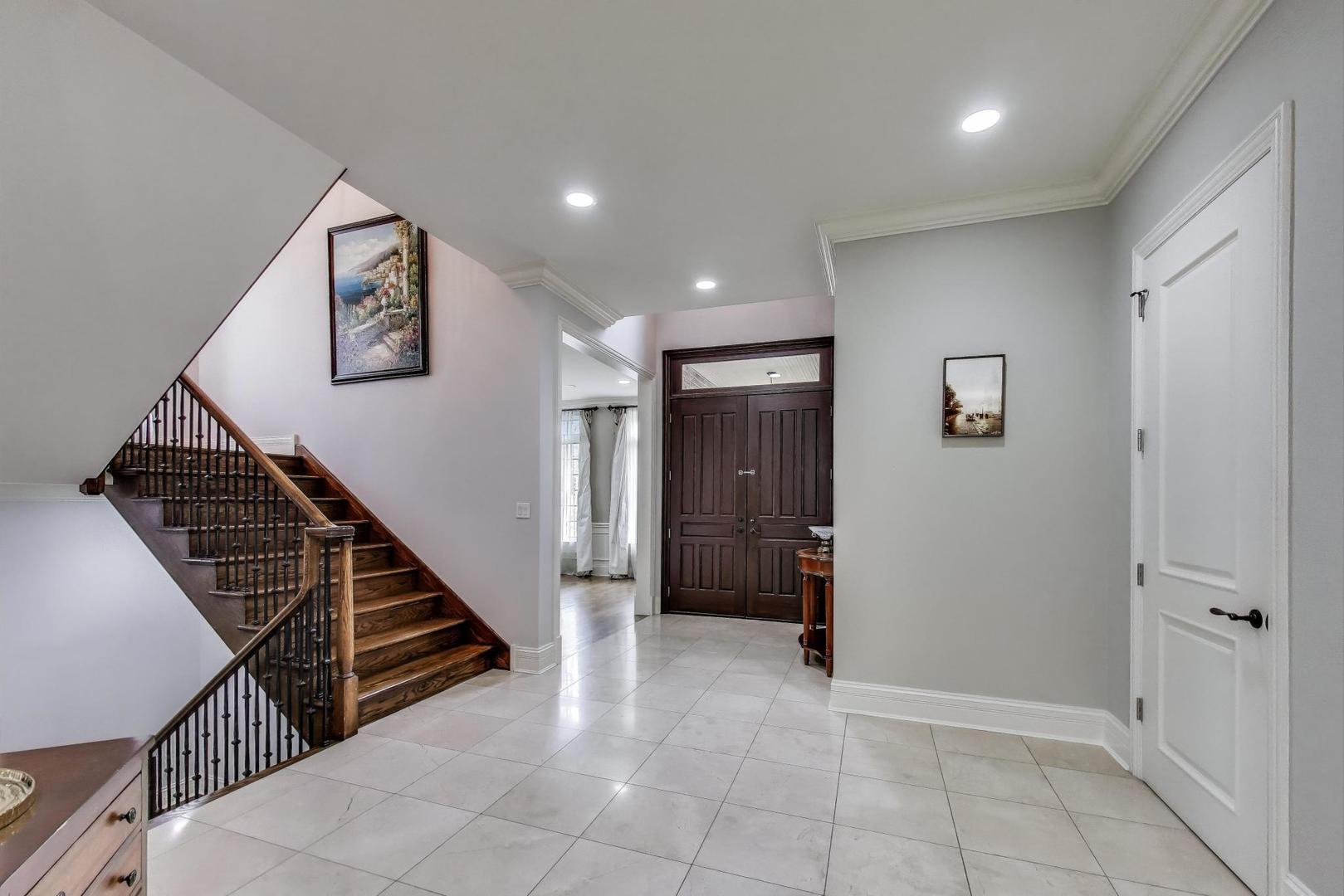 628 Greenwood Road Northbrook, IL 60062 - Photo 6 of 54 a view of an entryway with stairs