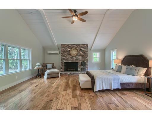 281 Hunters Ridge Road Concord, MA 01742 - Photo 13 of 26 a living room with furniture and a fireplace