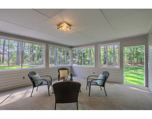281 Hunters Ridge Road Concord, MA 01742 - Photo 16 of 26 a living room with furniture and a large window