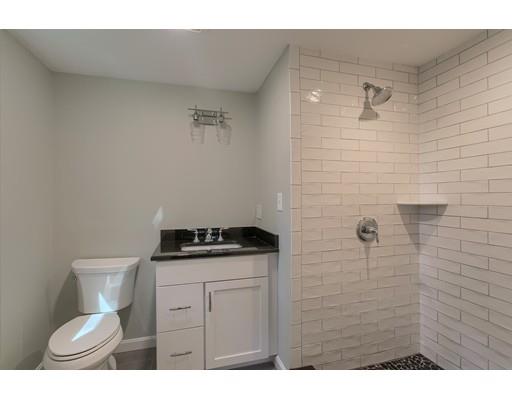 281 Hunters Ridge Road Concord, MA 01742 - Photo 20 of 26 a bathroom with a granite countertop toilet and a sink