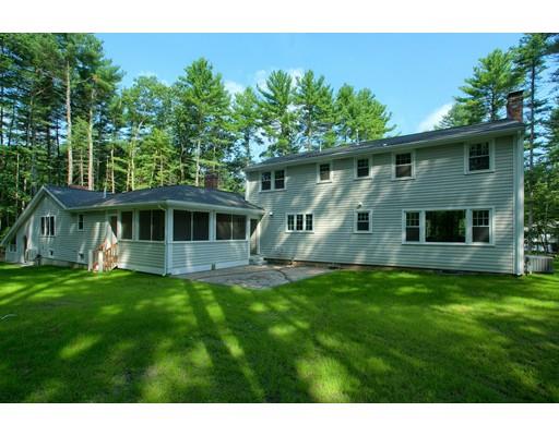 281 Hunters Ridge Road Concord, MA 01742 - Photo 26 of 26 a view of a yard in front of a house with a large tree