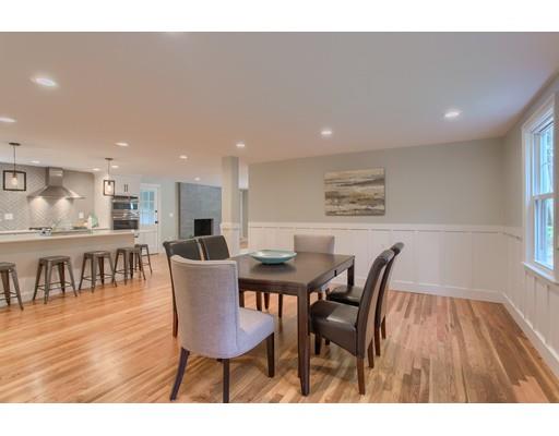 281 Hunters Ridge Road Concord, MA 01742 - Photo 8 of 26 a view of a dining room with furniture and wooden floor