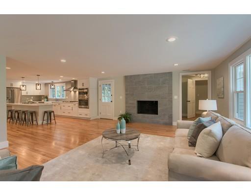 281 Hunters Ridge Road Concord, MA 01742 - Photo 10 of 26 a living room with furniture and a fireplace