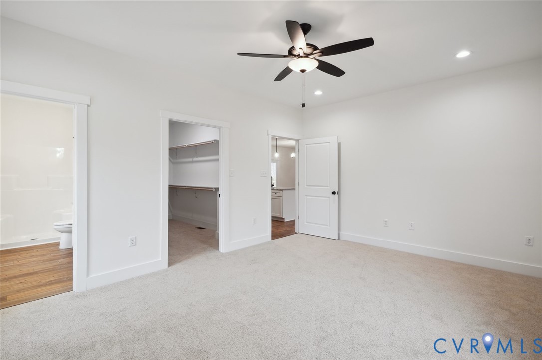 2090 Cartersville Road Cartersville, VA 23027 - Photo 20 of 35 an empty room with closet and a ceiling fan
