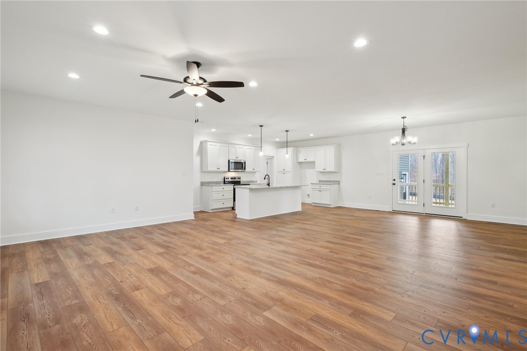 2090 Cartersville Road Cartersville, VA 23027 - Photo 6 of 35 a view of a kitchen with a sink and a stove top oven