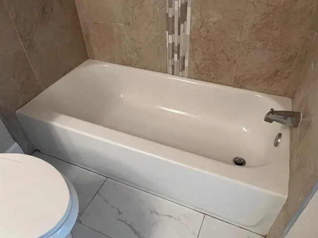 a bathroom with a bathtub