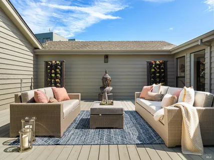 a view of a living room with furniture