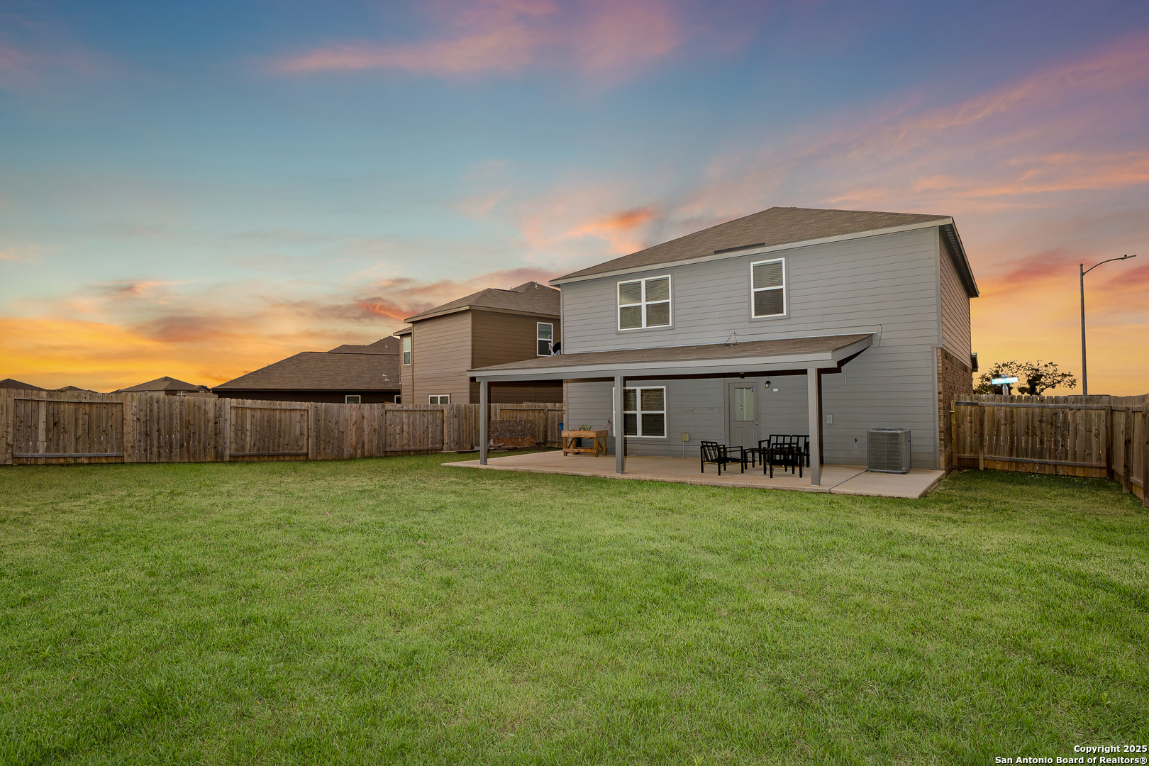 15102 Jetfire Von Ormy, TX 78073 - Photo 37 of 37 a view of a house with a yard and sitting area