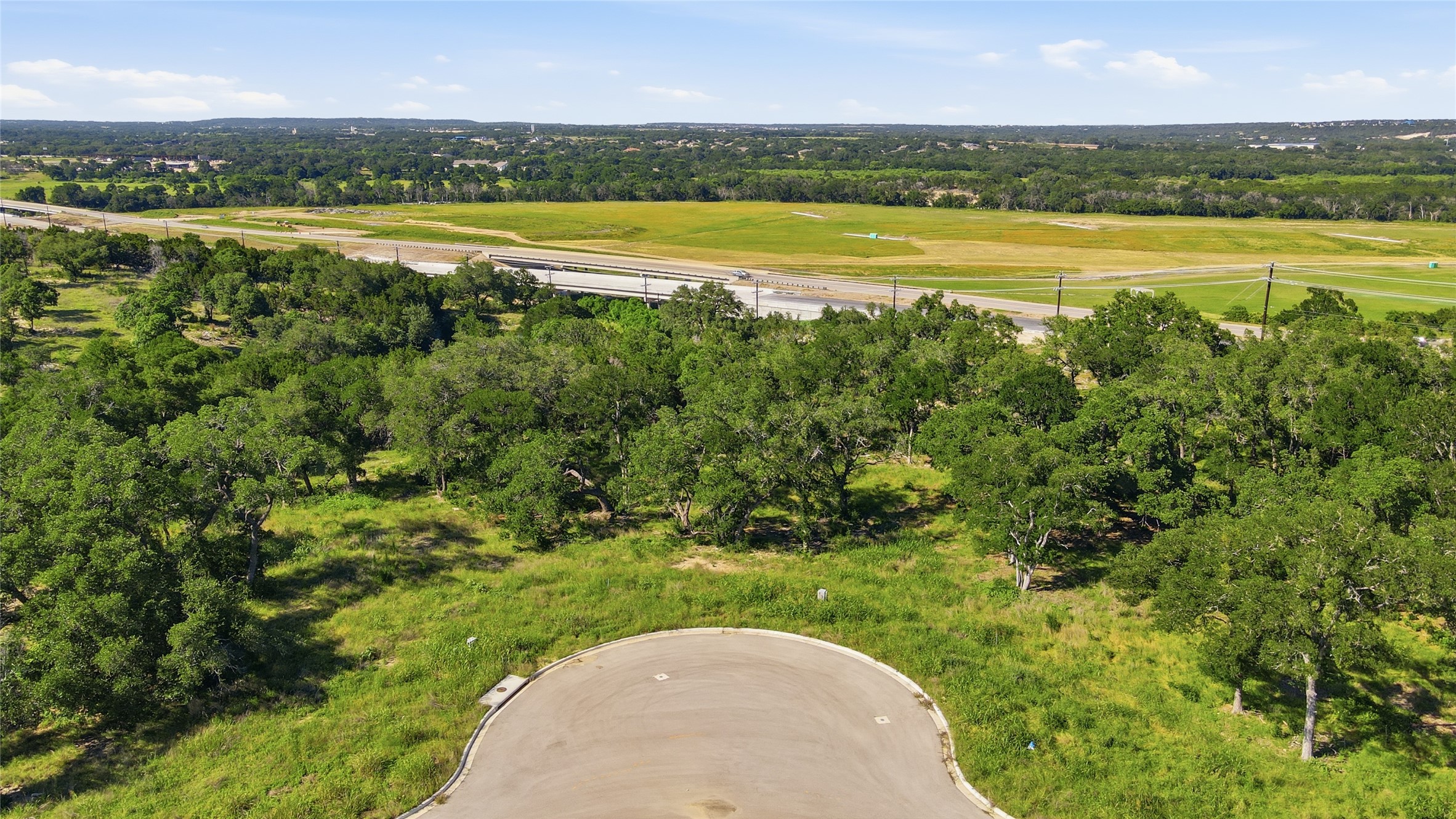 152 West Rio Rnch Road Liberty Hill, TX 78642 - Photo 4 of 27 a view of a city and an ocean view