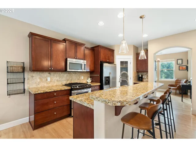 a living room with furniture toys and a flat screen tv
