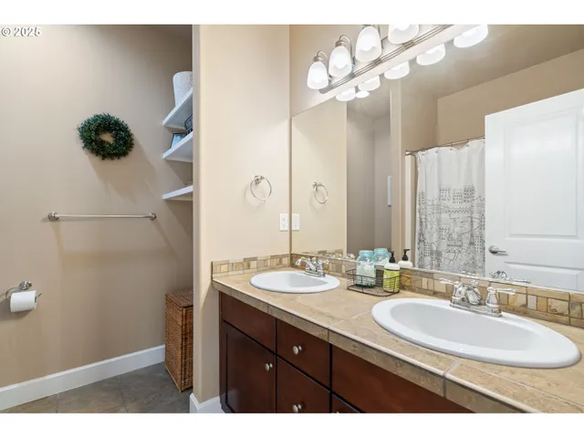 a view of a hallway view with wooden floor and furniture