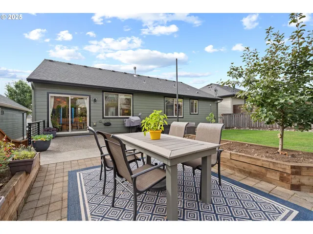 a picture of a bench in front of a building