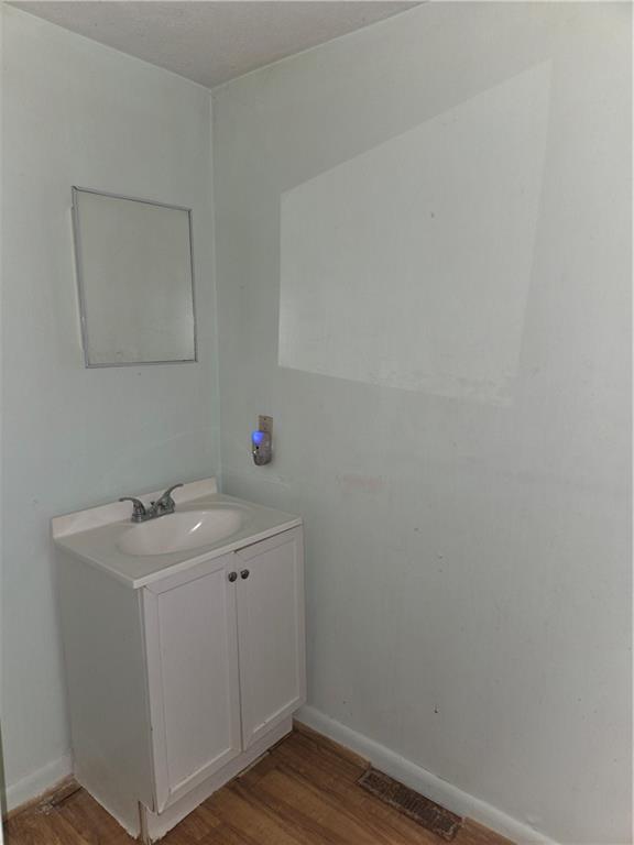 2509 Webster Avenue Pittsburgh, PA 15219 - Photo 13 of 19 a bathroom with a sink and vanity