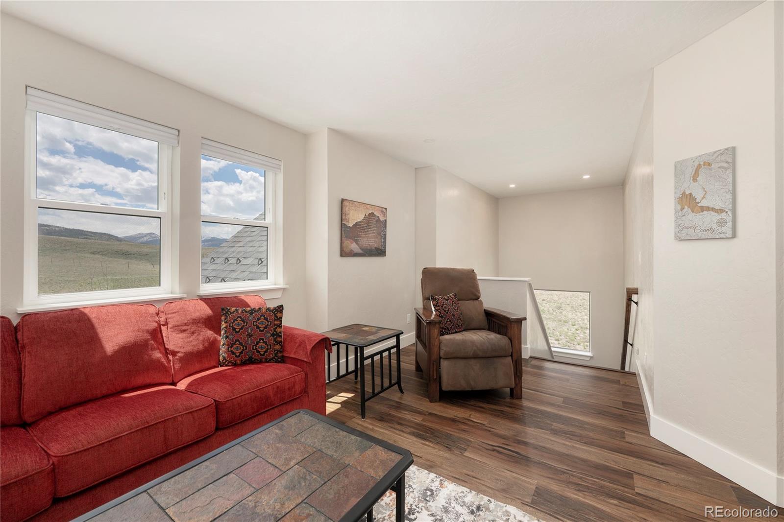 719 Saddle Ridge Circle Granby, CO 80446 - Photo 17 of 47 a living room with furniture and a window