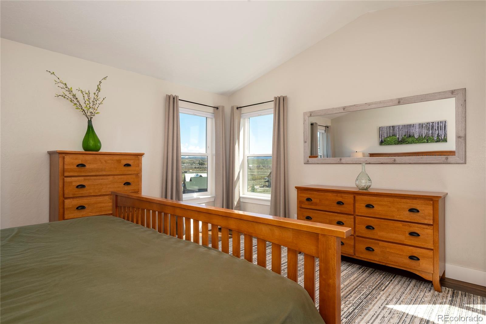 719 Saddle Ridge Circle Granby, CO 80446 - Photo 20 of 47 a view of a bedroom with furniture and a window