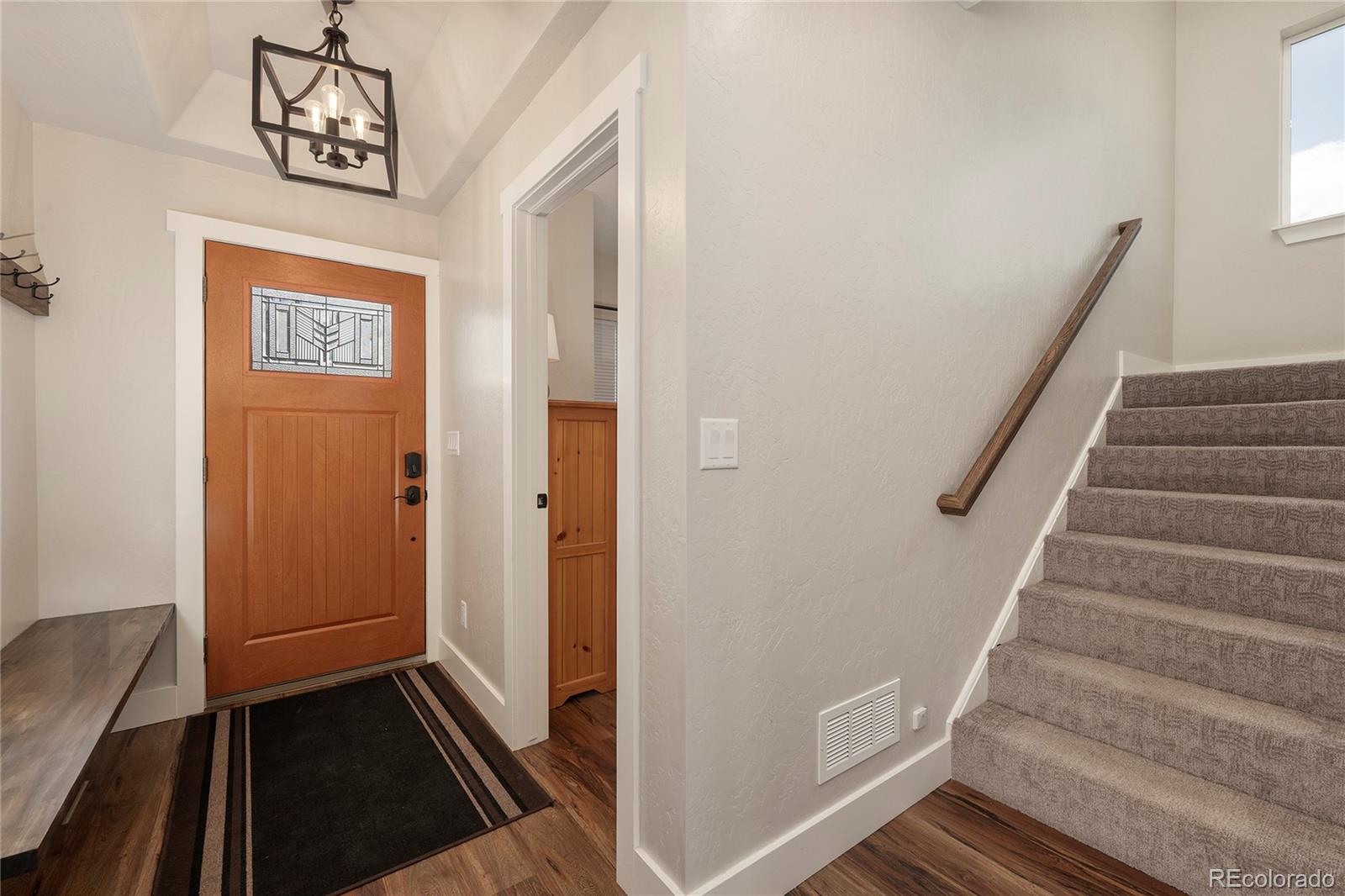 719 Saddle Ridge Circle Granby, CO 80446 - Photo 2 of 47 a view of a hallway with front door
