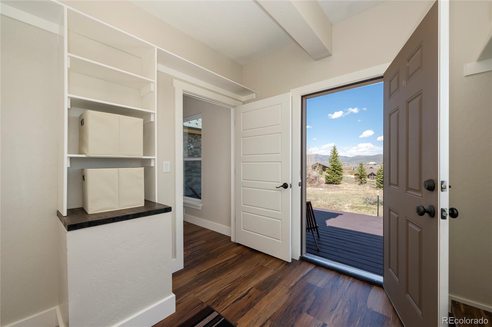 719 Saddle Ridge Circle Granby, CO 80446 - Photo 33 of 47 wooden floor in an empty room