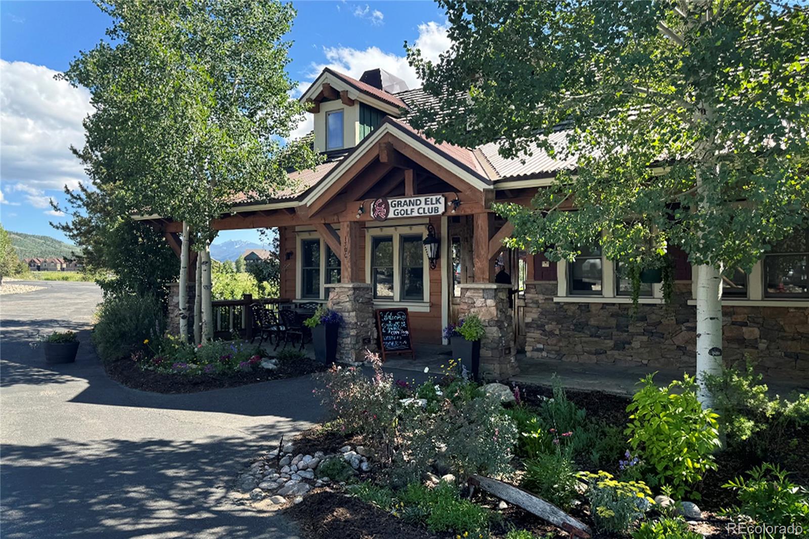 719 Saddle Ridge Circle Granby, CO 80446 - Photo 47 of 47 a front view of a house with garden