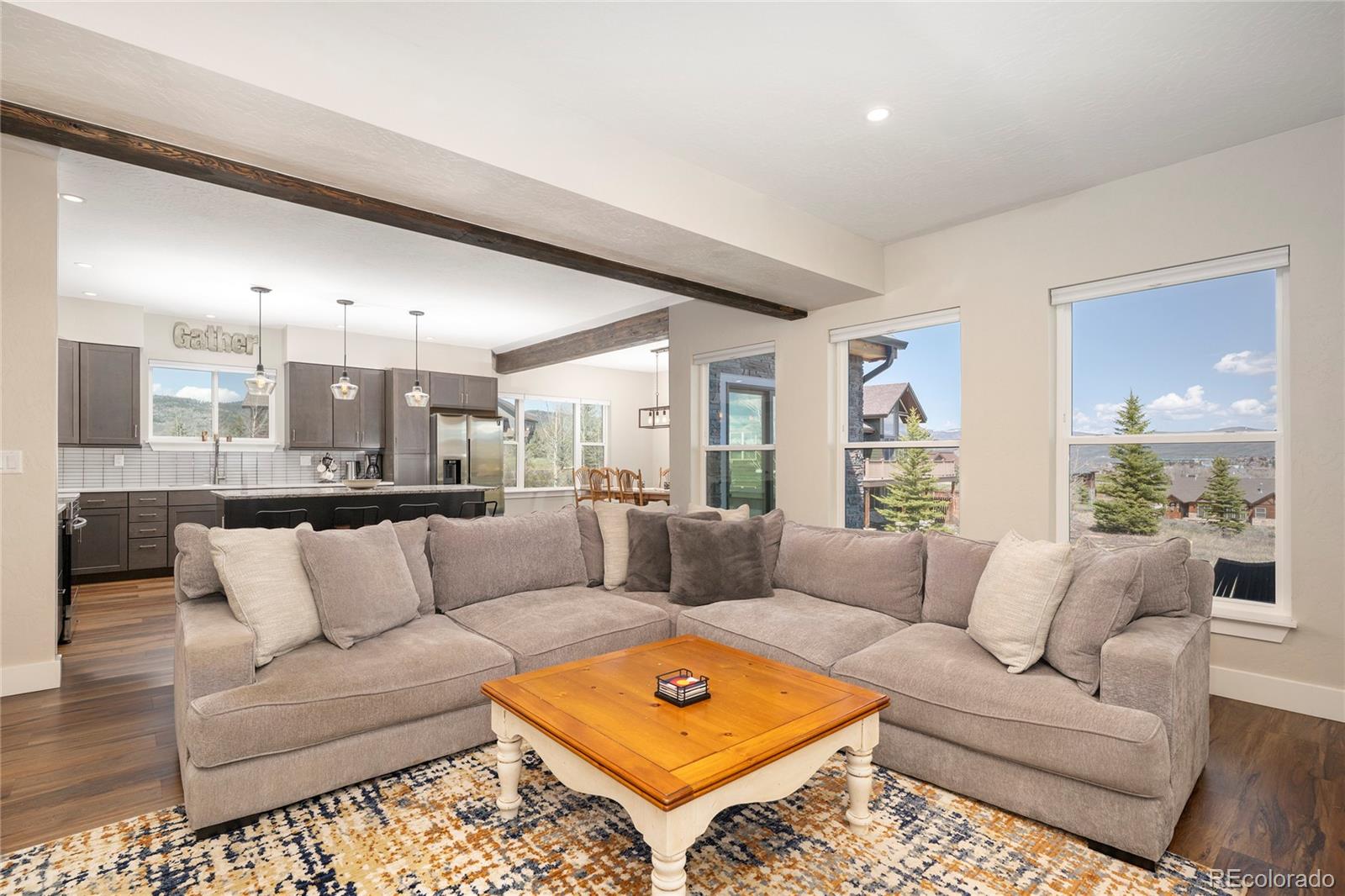 719 Saddle Ridge Circle Granby, CO 80446 - Photo 10 of 47 a living room with furniture and a couch