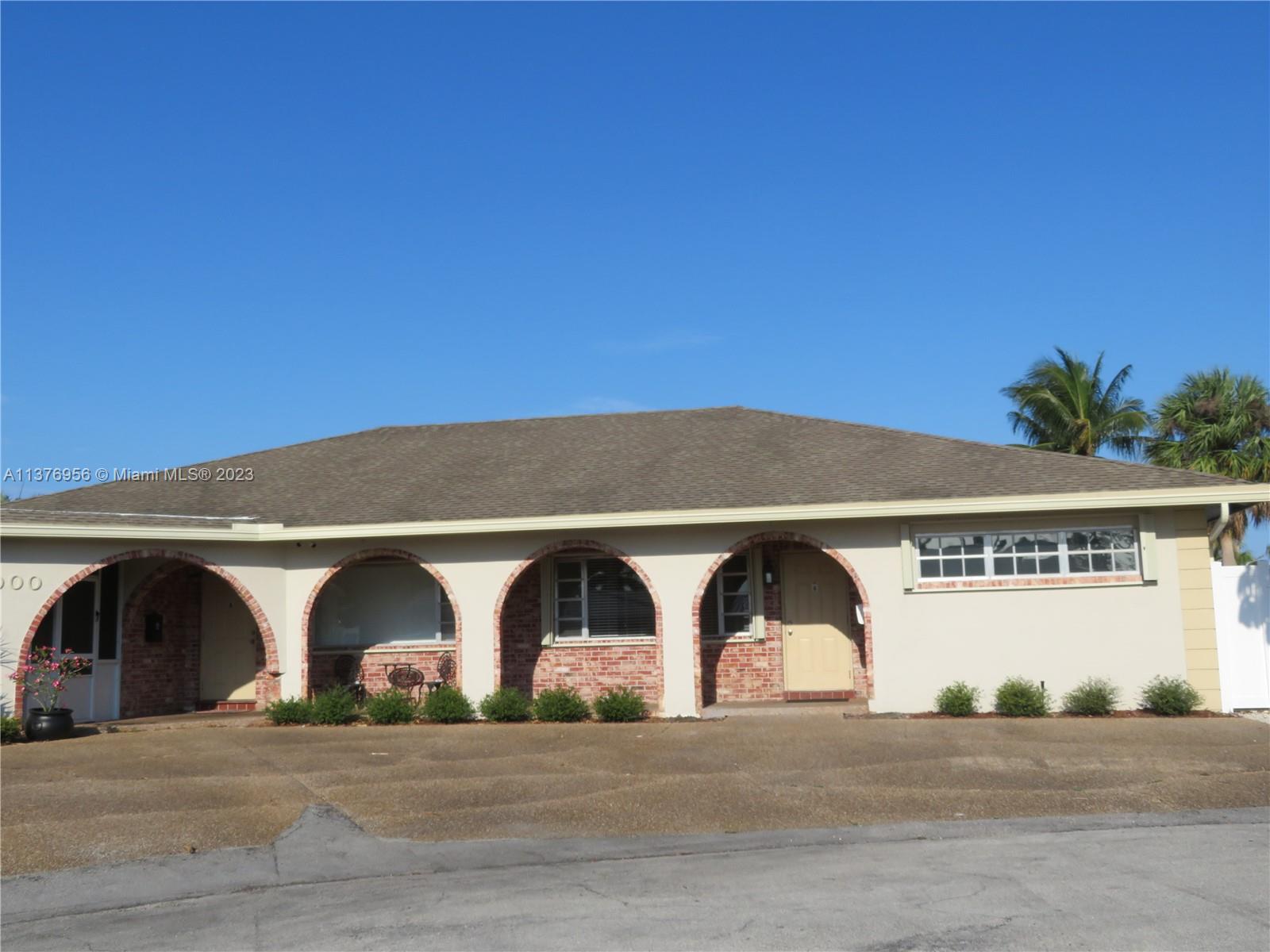3000 Northeast 19th Terrace, Unit B Lighthouse Point, FL 33064 - Photo 1 of 2 a front view of a house