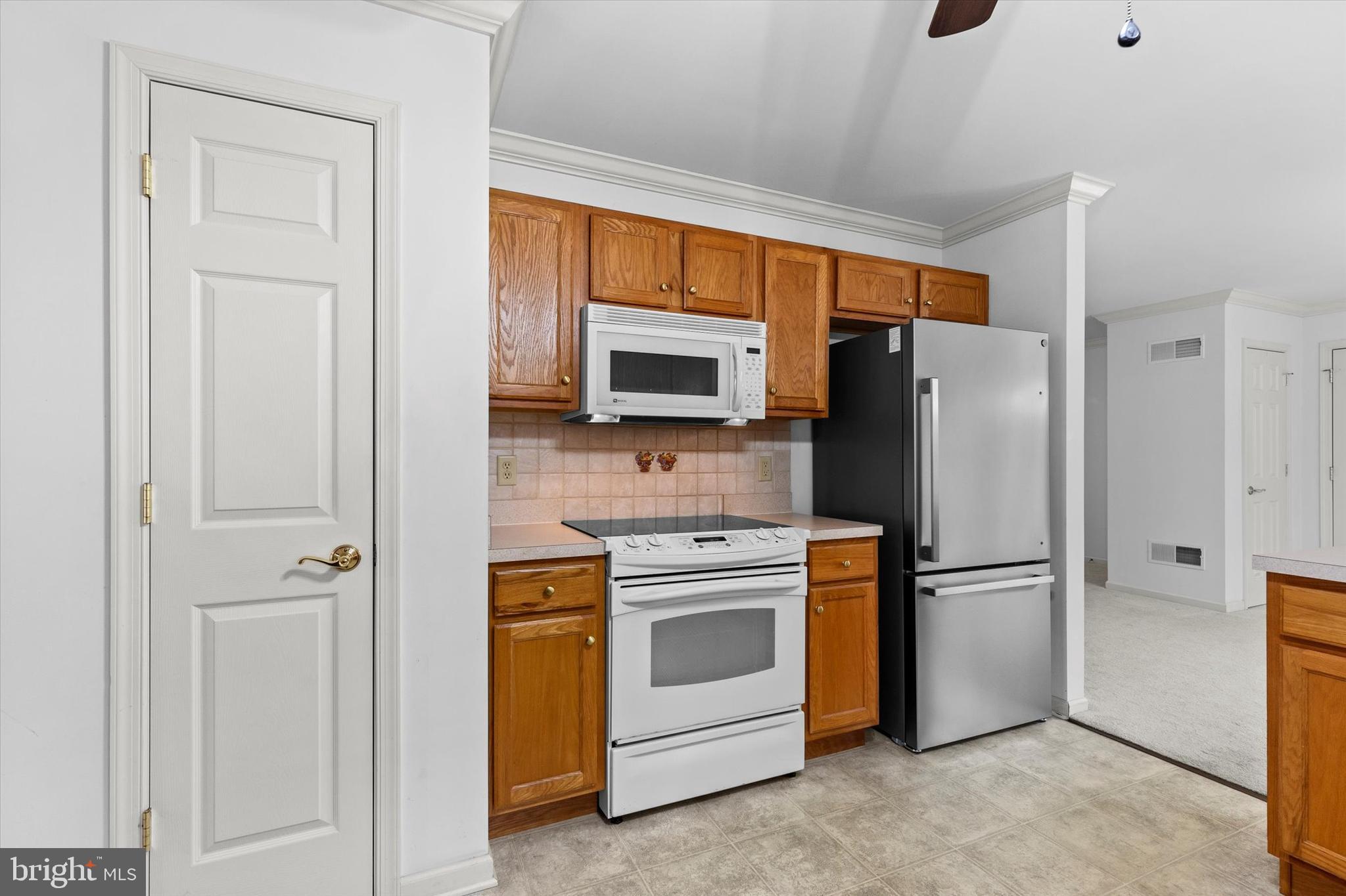 218 Equine Cove Red Lion, PA 17356 - Photo 11 of 24 a kitchen with a refrigerator stove and microwave