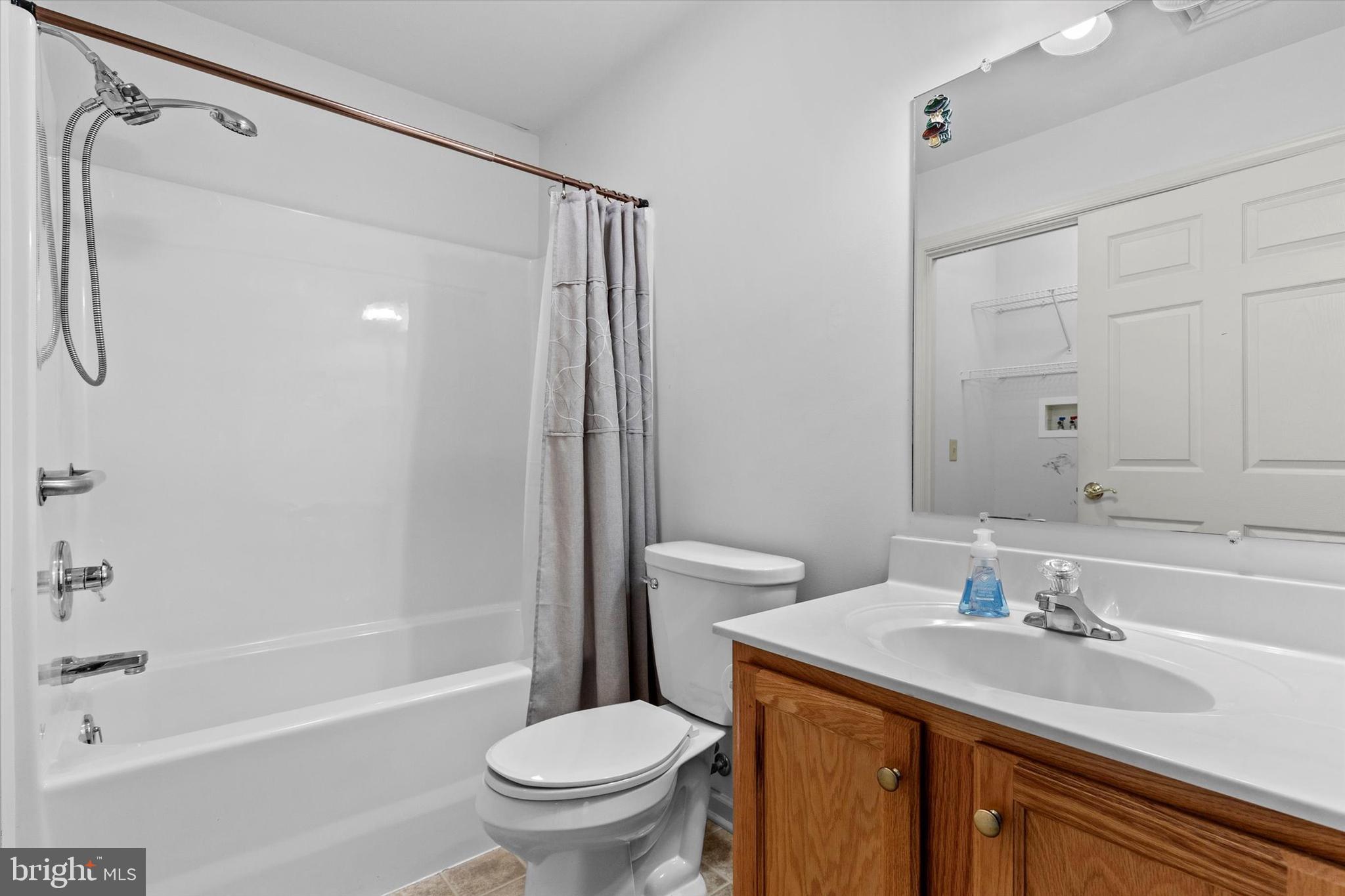 218 Equine Cove Red Lion, PA 17356 - Photo 14 of 24 a bathroom with a sink toilet and shower