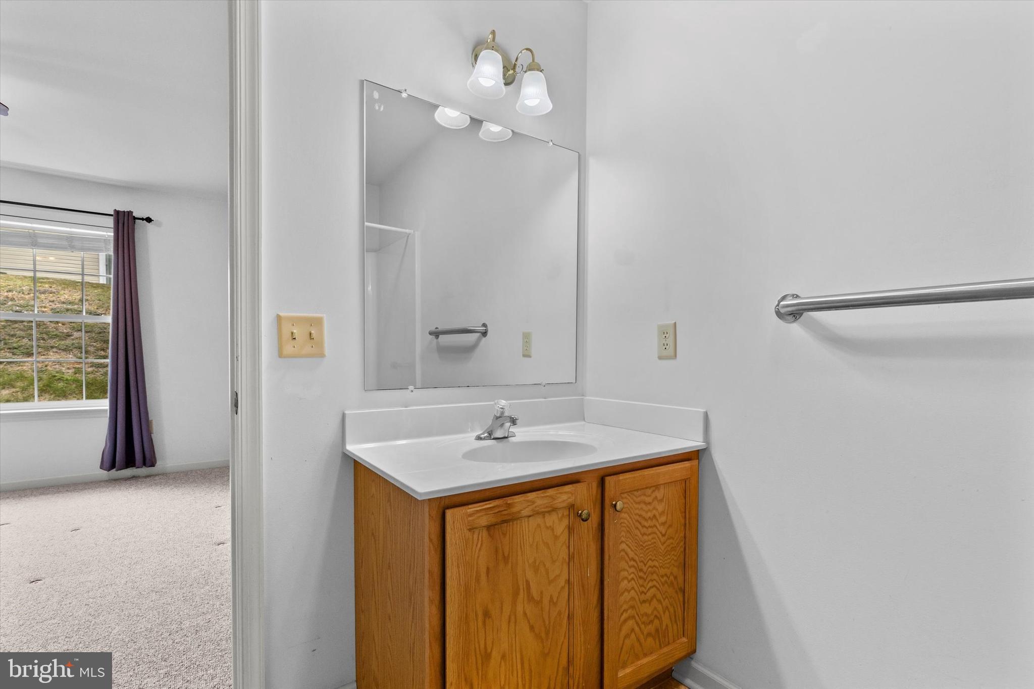 218 Equine Cove Red Lion, PA 17356 - Photo 18 of 24 a bathroom with a sink vanity and mirror