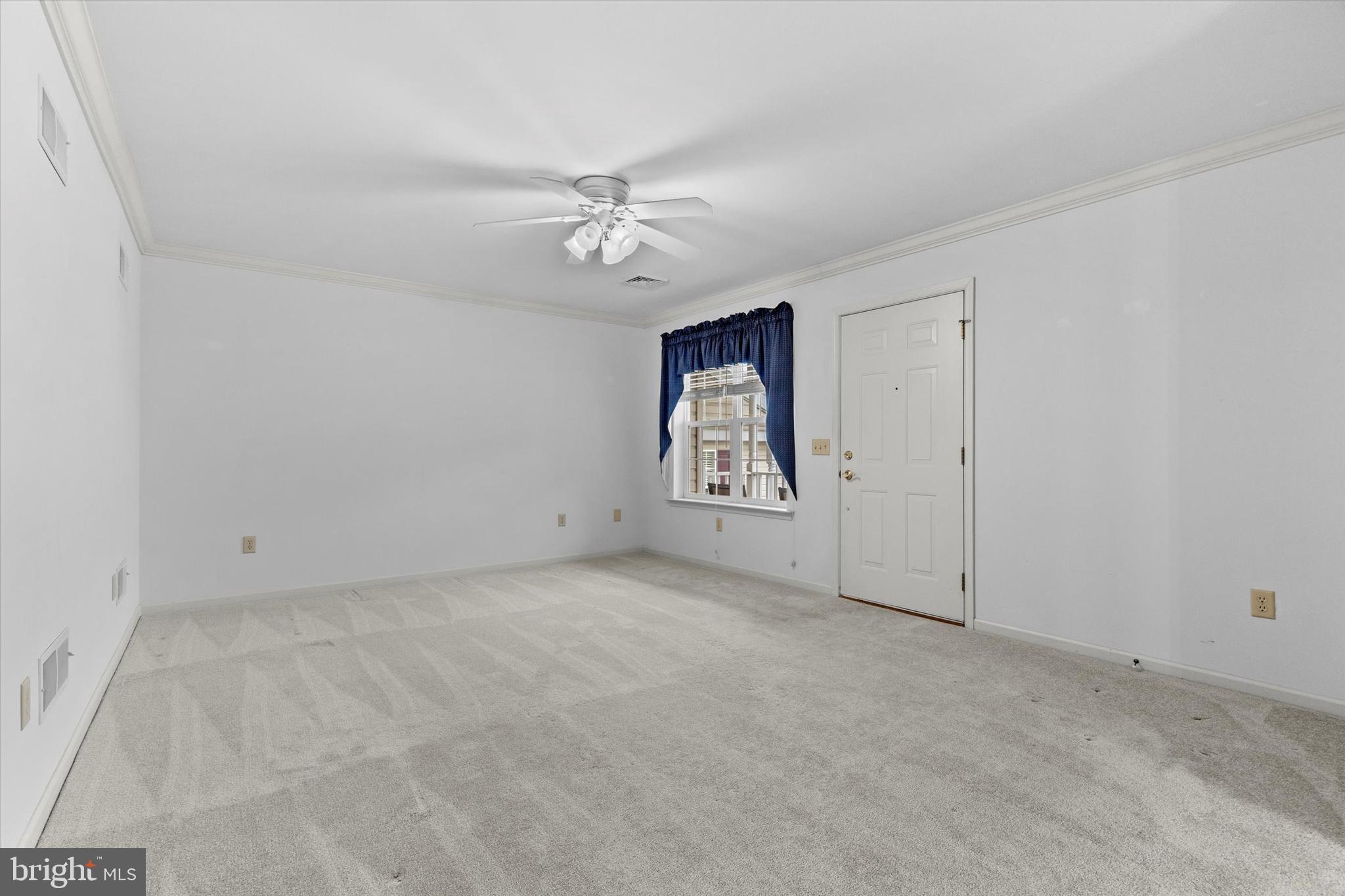 218 Equine Cove Red Lion, PA 17356 - Photo 5 of 24 an empty room with windows and fan