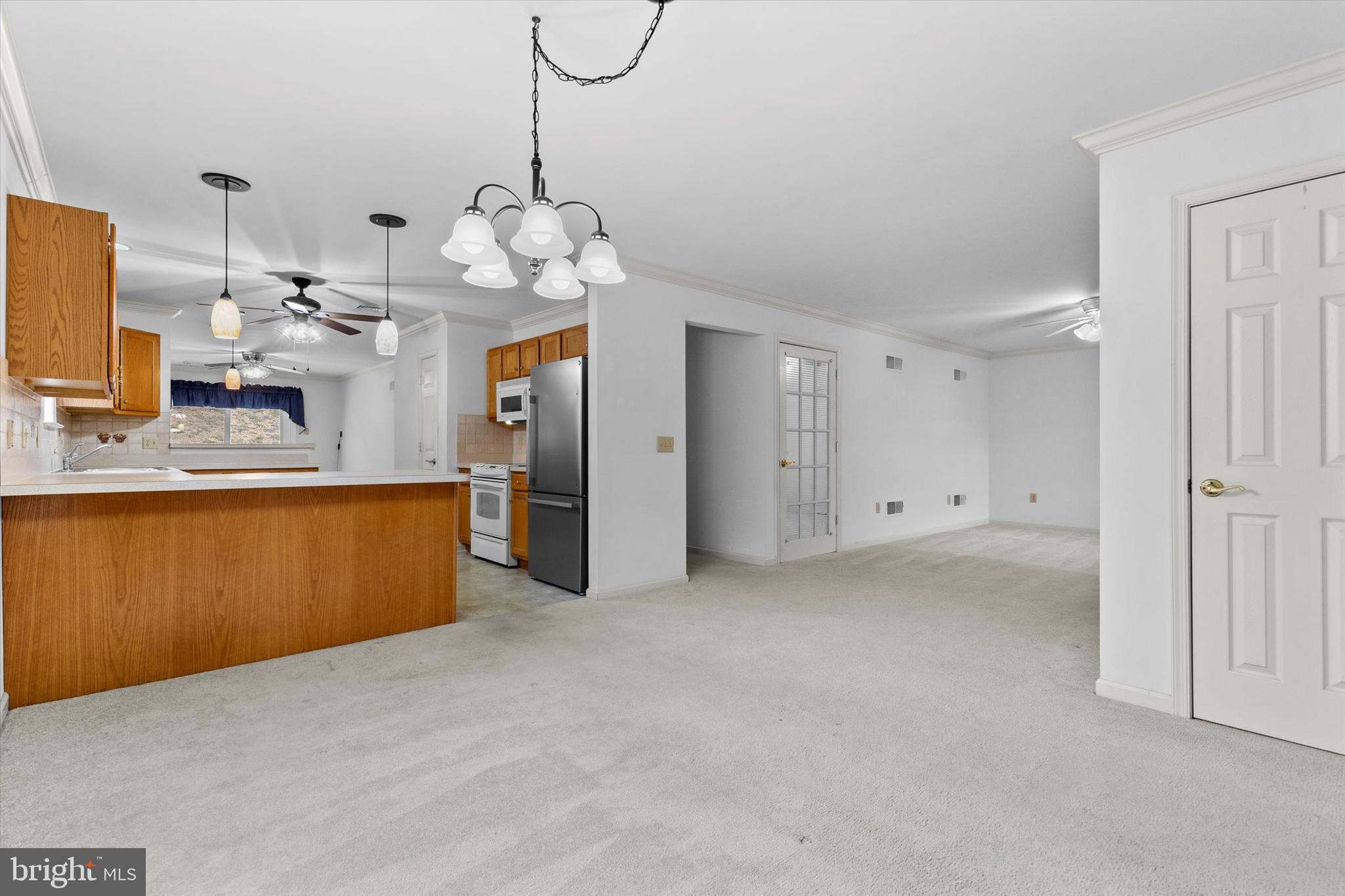 218 Equine Cove Red Lion, PA 17356 - Photo 8 of 24 a view of a kitchen with a sink and refrigerator