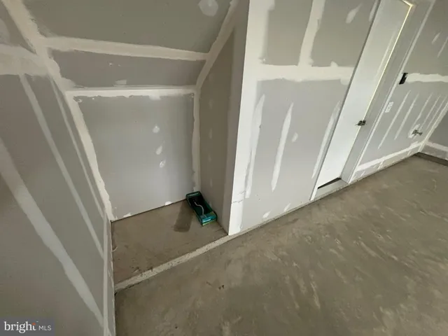 a view of a hallway with staircase