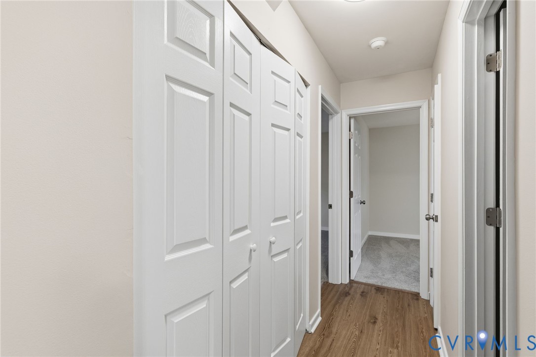 8736 Sunset Knoll Road Richmond, VA 23237 - Photo 11 of 26 a view of a bathroom from the hallway
