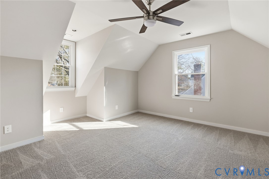 8736 Sunset Knoll Road Richmond, VA 23237 - Photo 17 of 26 a view of an empty room with a window