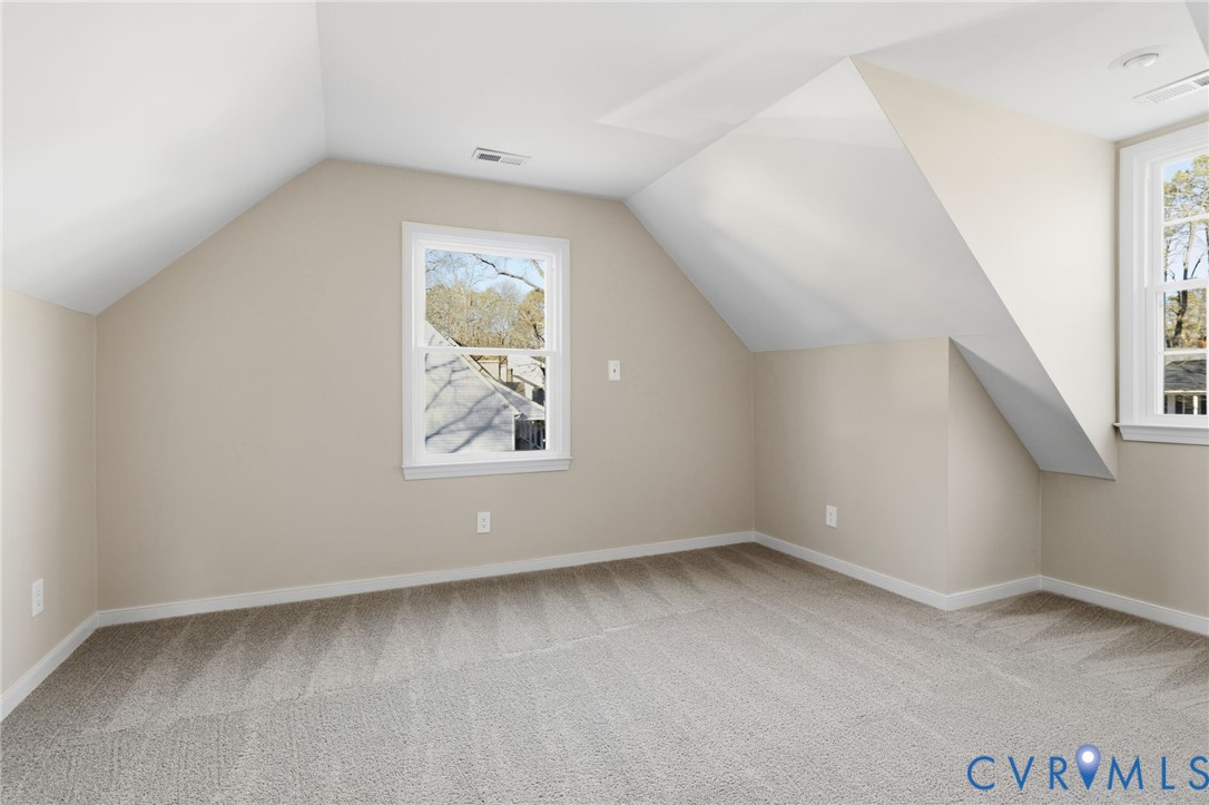 8736 Sunset Knoll Road Richmond, VA 23237 - Photo 19 of 26 an empty room with a window