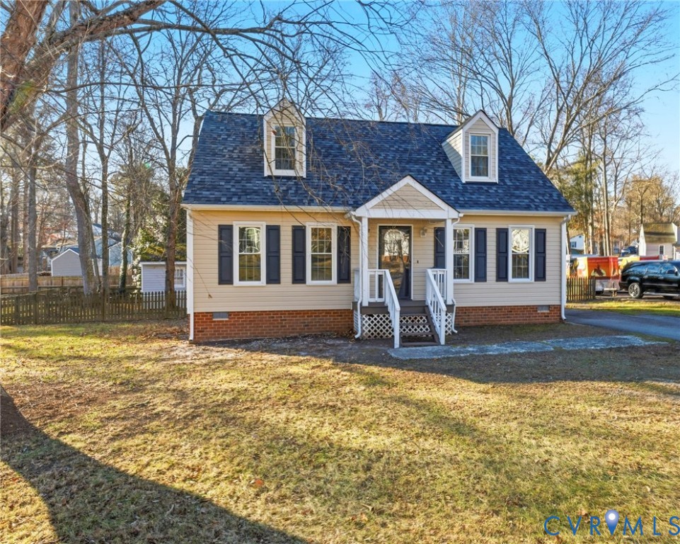 8736 Sunset Knoll Road Richmond, VA 23237 - Photo 2 of 26 a front view of a house with a yard