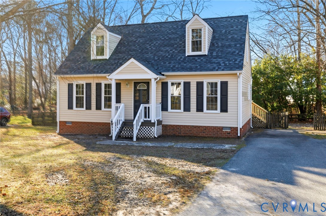 8736 Sunset Knoll Road Richmond, VA 23237 - Photo 3 of 26 a view of a house with a yard