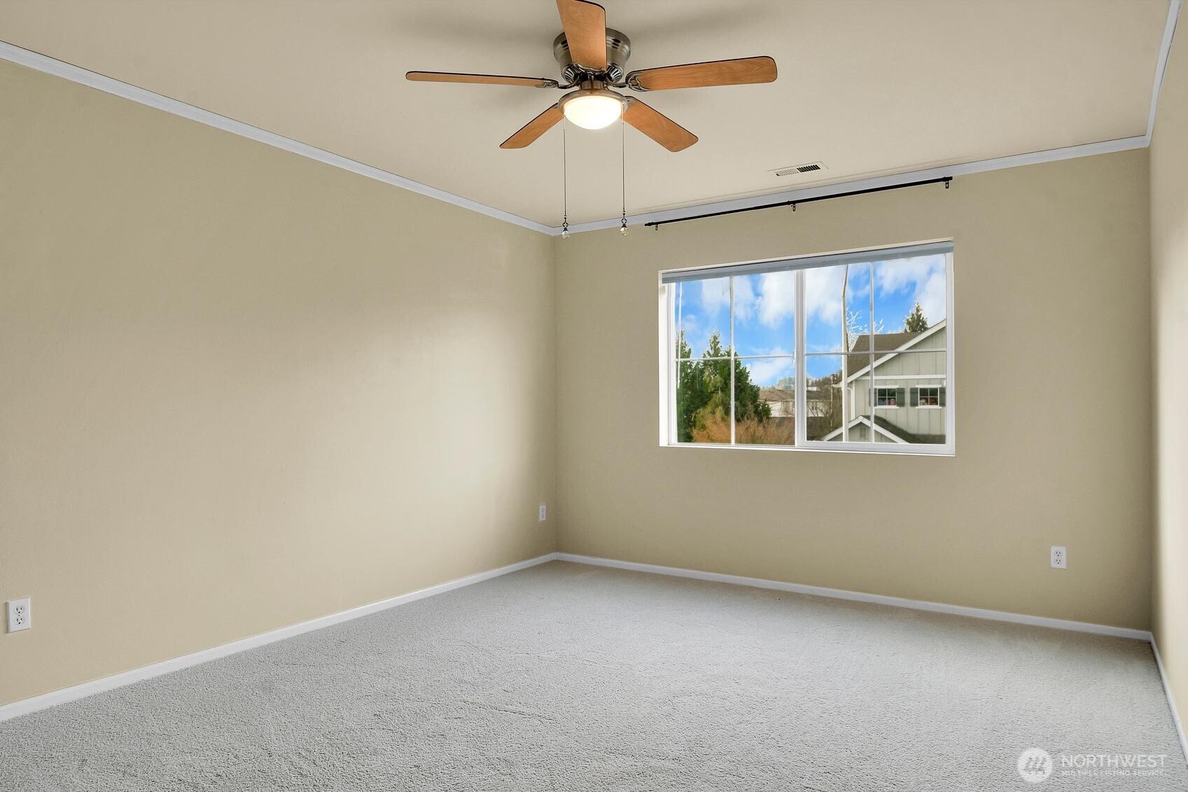 3259 Destination Avenue East Fife, WA 98424 - Photo 13 of 33 an empty room with a window and a ceiling fan