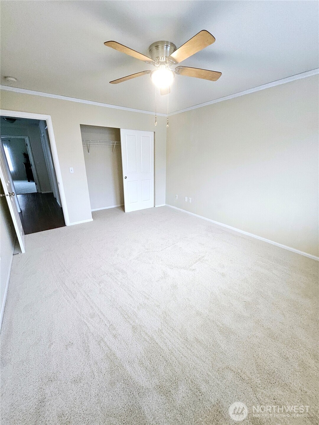 3259 Destination Avenue East Fife, WA 98424 - Photo 14 of 33 a view of an empty room with a ceiling fan