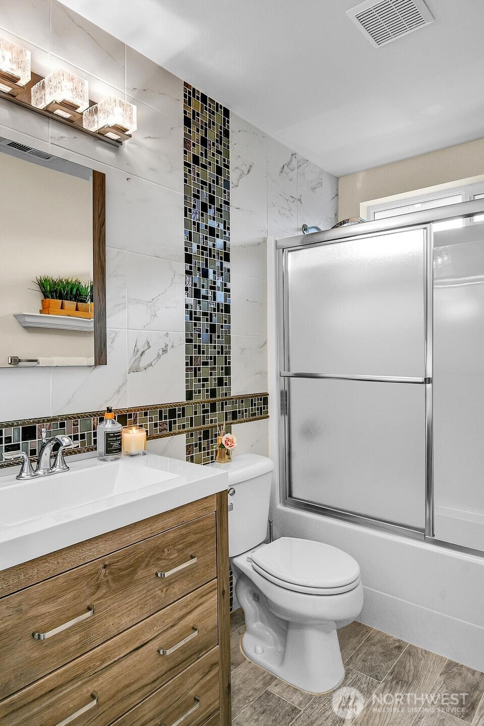 3259 Destination Avenue East Fife, WA 98424 - Photo 15 of 33 a bathroom with a sink a toilet and shower