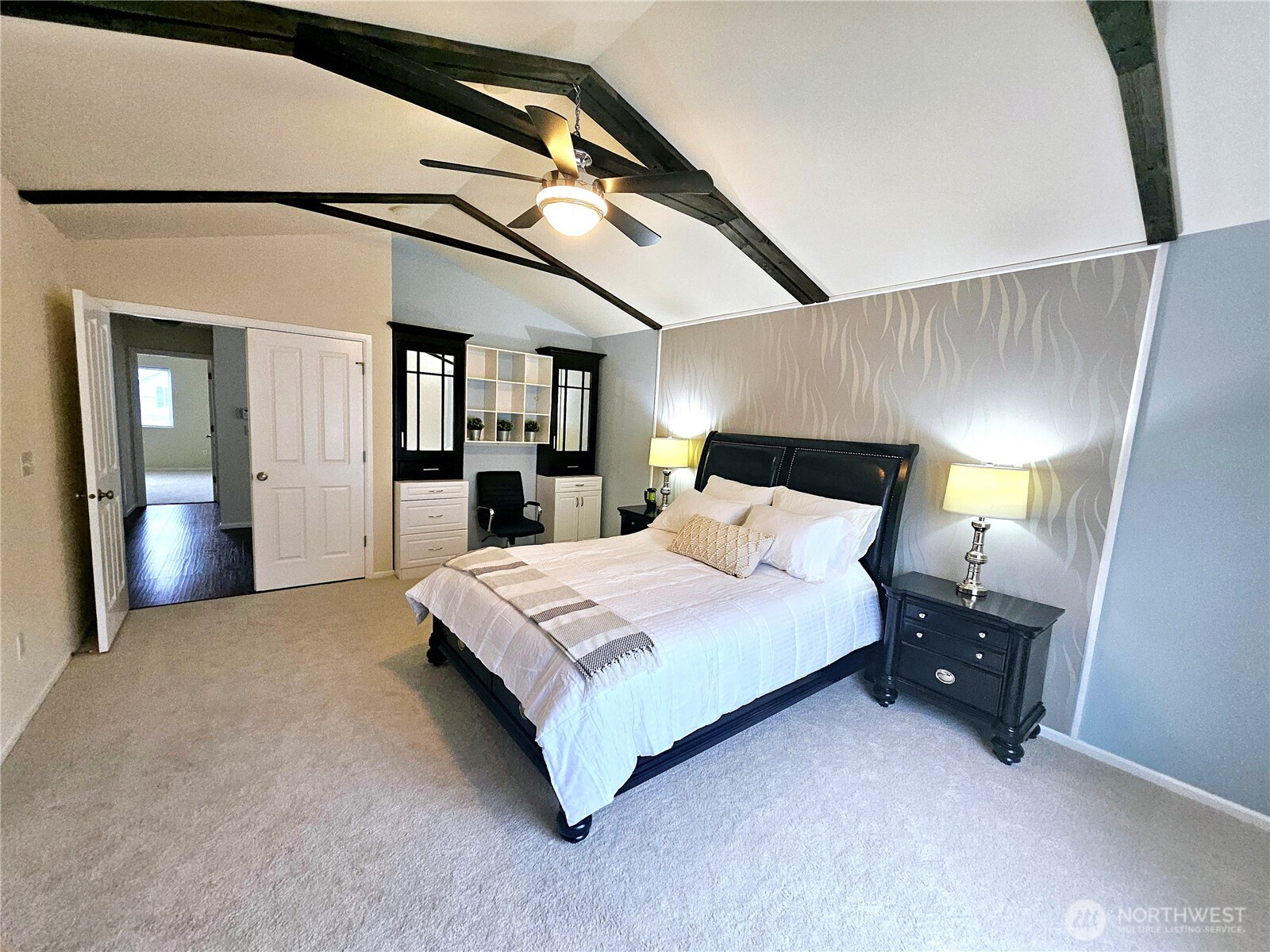 3259 Destination Avenue East Fife, WA 98424 - Photo 16 of 33 a bedroom with a bed and a large mirror