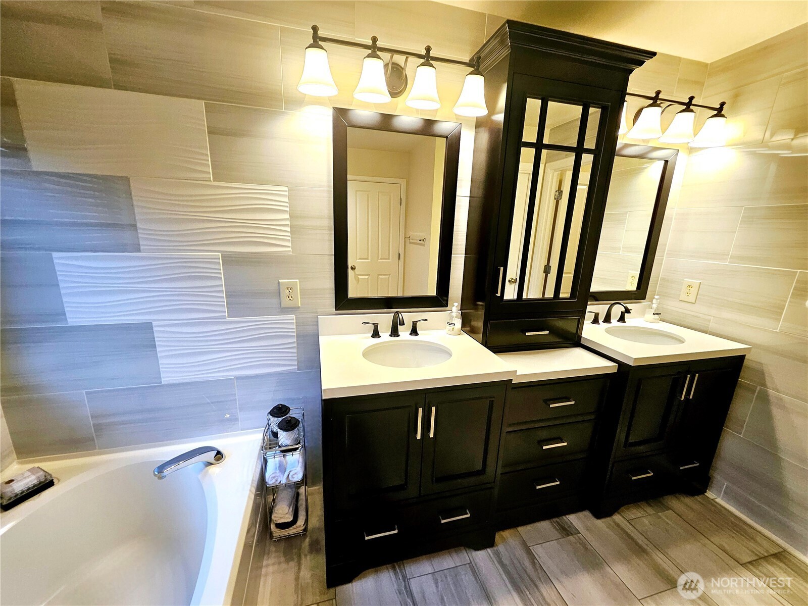 3259 Destination Avenue East Fife, WA 98424 - Photo 23 of 33 a bathroom with a sink vanity and a mirror