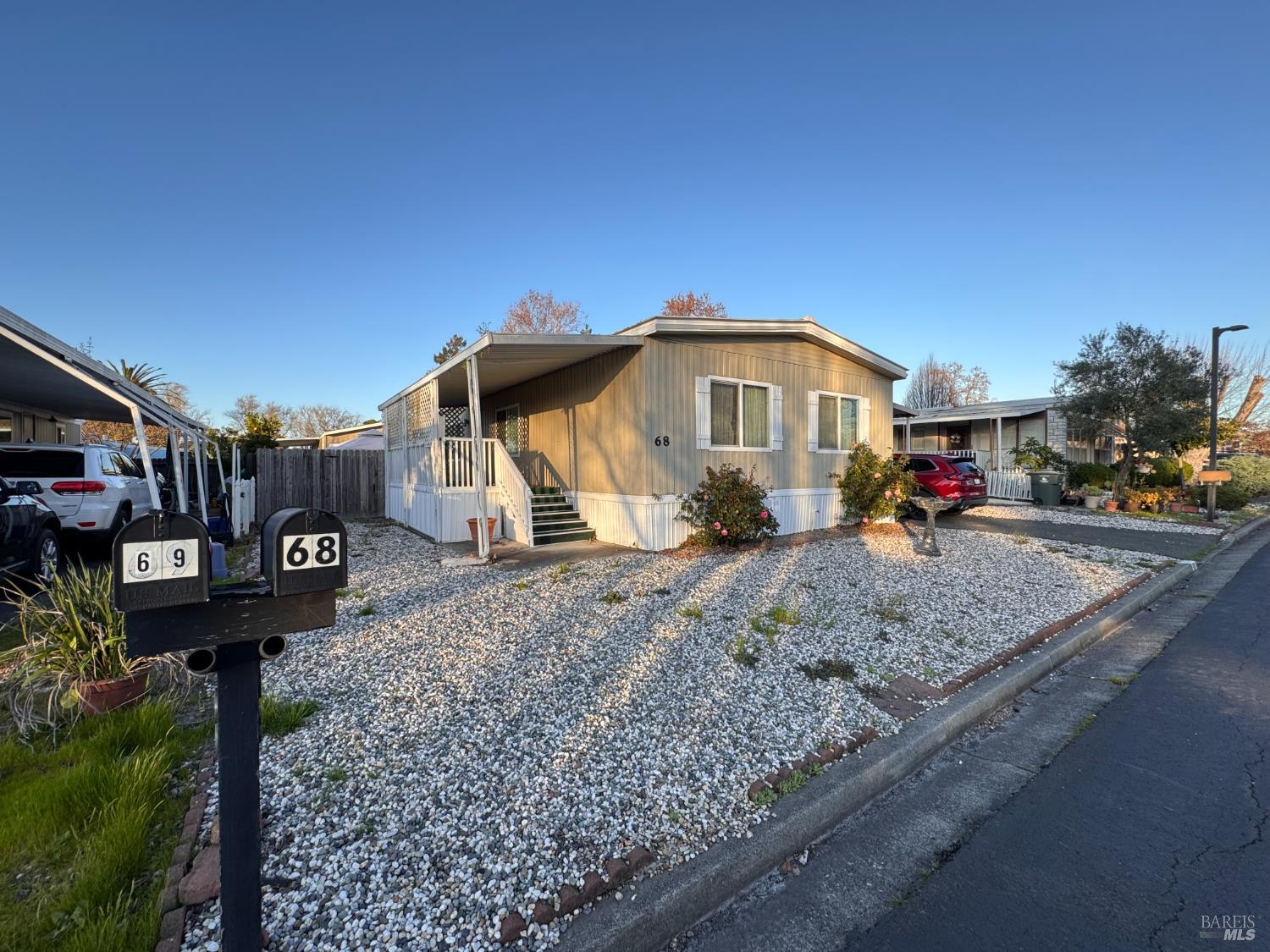 260 American Canyon Road, Unit 68 American Canyon, CA 94589 - Photo 1 of 1 a view of a house with a yard and sitting area