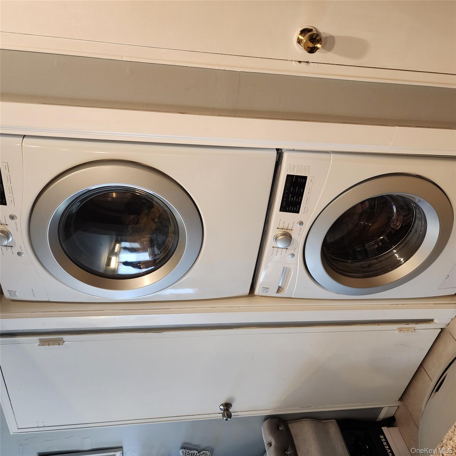 2 D Valley Forge Court Ridge, NY 11961 - Photo 11 of 13 a close up view of a washer and dryer