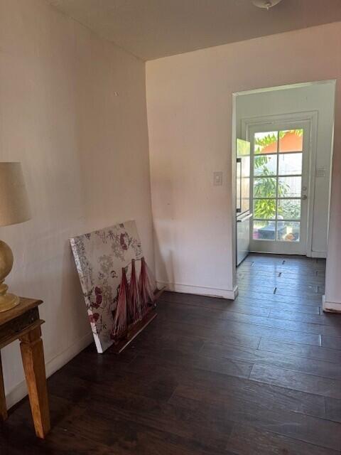 545 Southwest 4th Street, Unit 1 Belle Glade, FL 33430 - Photo 4 of 9 a view of a livingroom with wooden floor