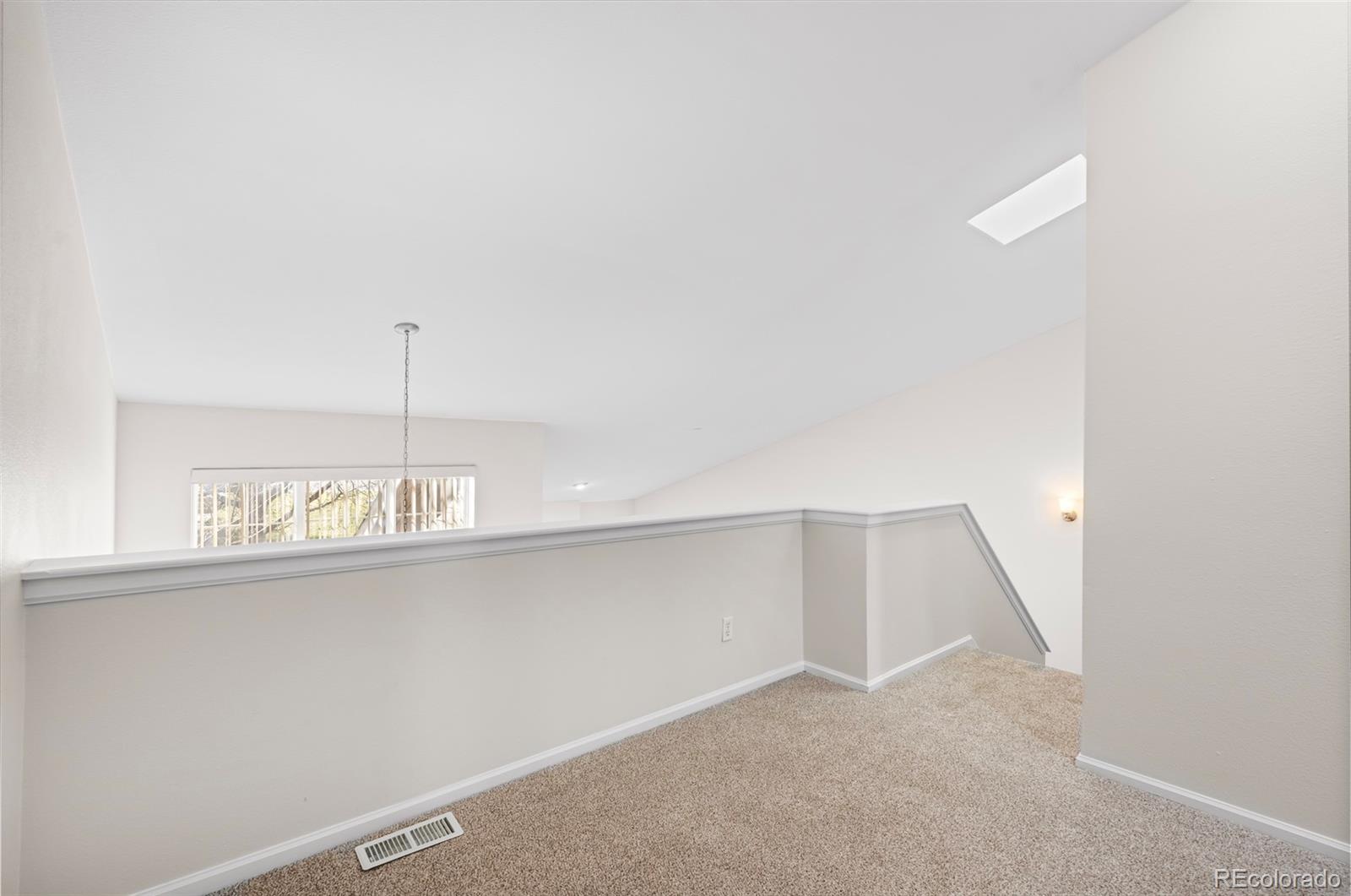 6828 Zenobia Street, Unit 2 Westminster, CO 80030 - Photo 16 of 24 a view of an empty room